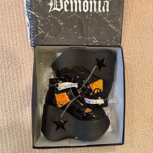 Demonia Glossy Black Platform Shoes with Star Chains